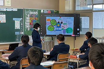 A student giving presentation, showing the materials on the screen