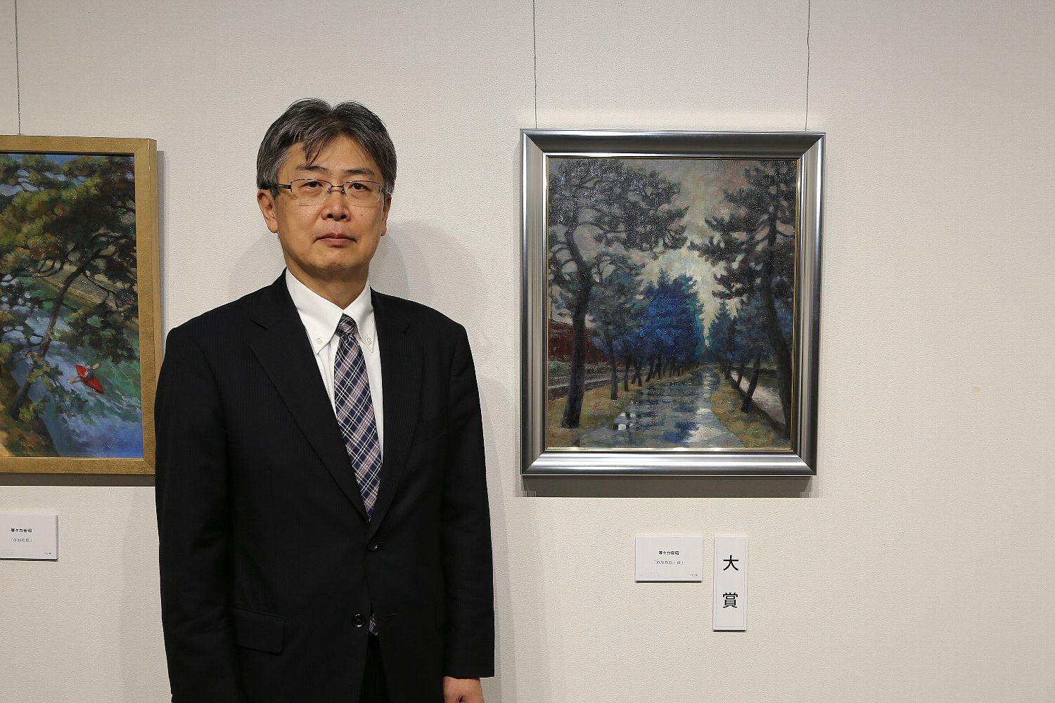 大賞「草加松原・雨」と作者 等々力安昭氏の画像